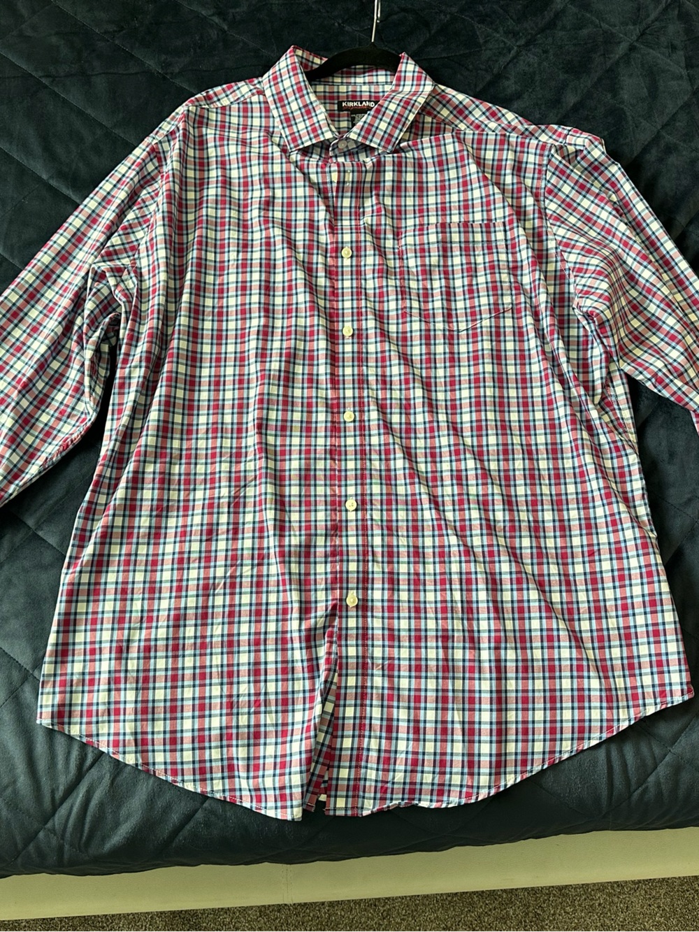 3 Kirkland Signature performance shirts